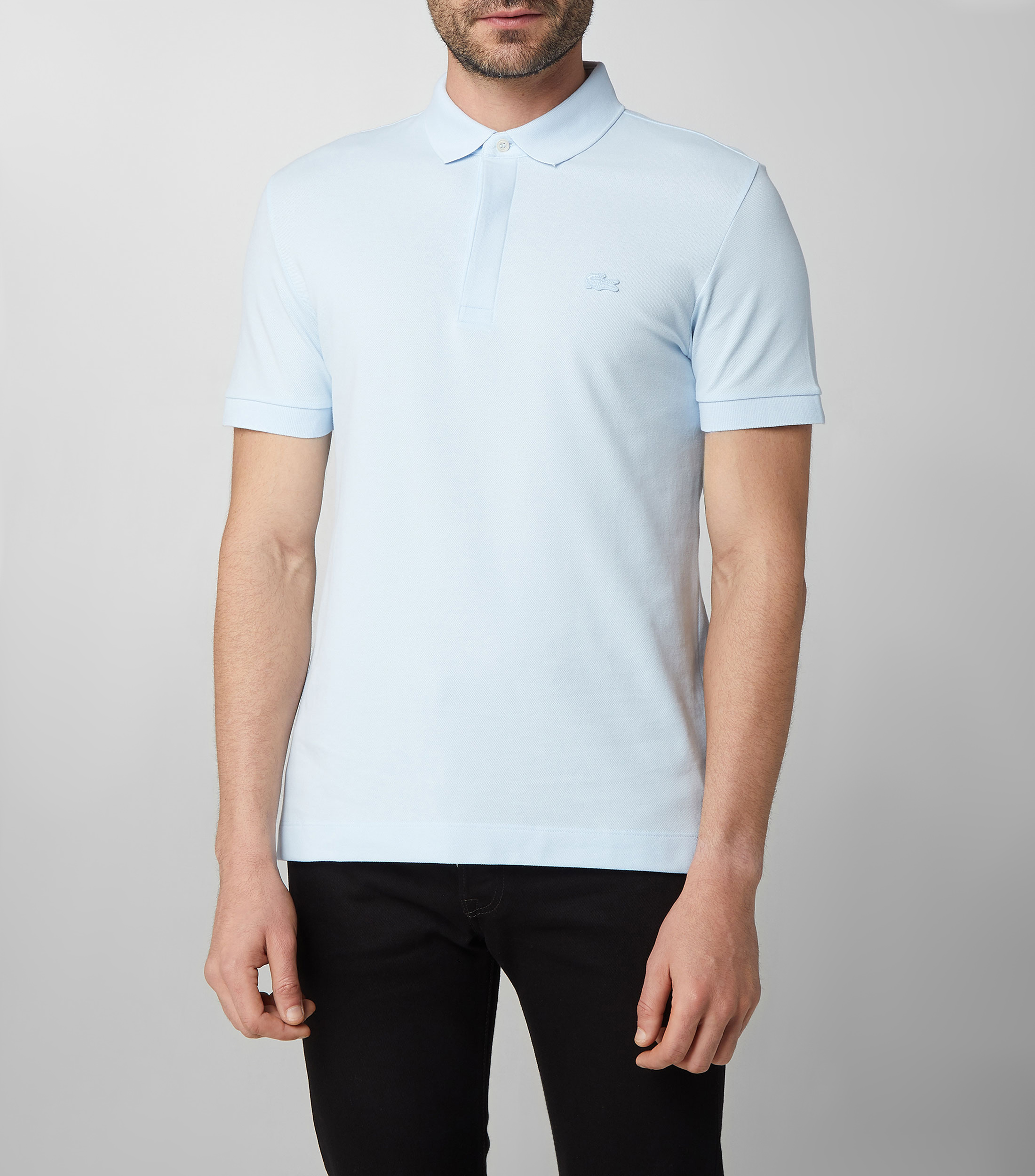 Playera tipo Polo con manga corta y diseño liso Hombre